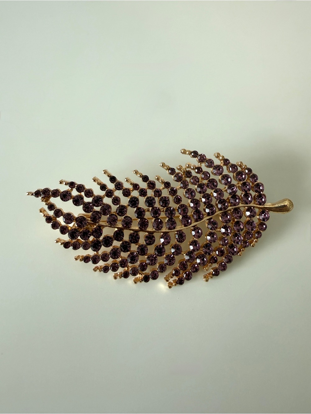 Gold Leaf Brooch with Purple Stones